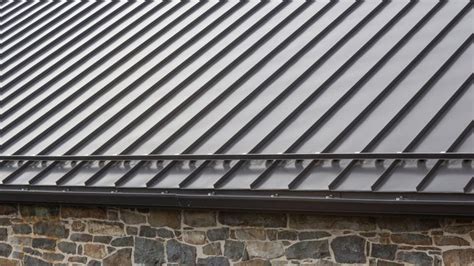 cost of metal standing sean roof for 7000 sf house|standing seam metal roof installation.